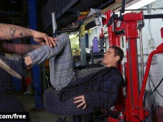 Boss Markus Kage shows newby mechanic how machine works 0044 gif